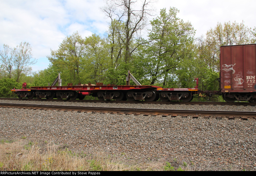 A heavy duty flat car